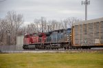 CP + CEFX AC44CW Locomotives leading a train